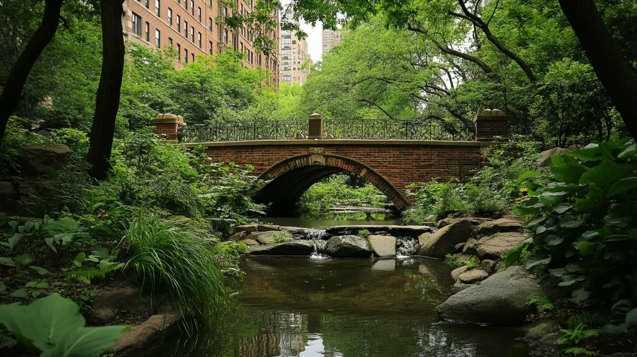 Brick pedestrian bridge over a small stream surrounded by lush greenery in New York City