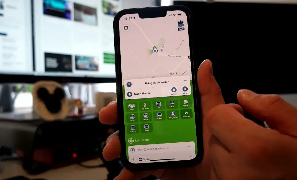 A hand navigates Citymapper app