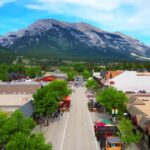 Aerial view of a town surrounded by mountains