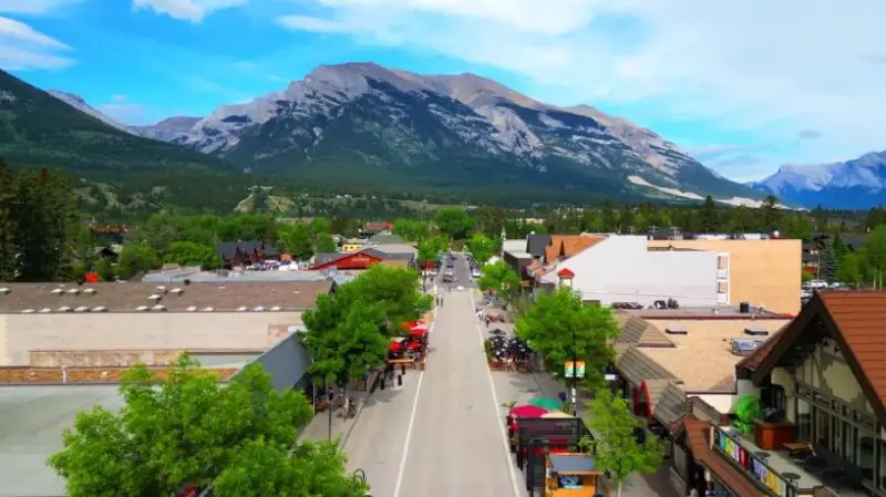 Aerial view of a town surrounded by mountains