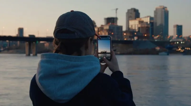 Man filming New York City on his phone