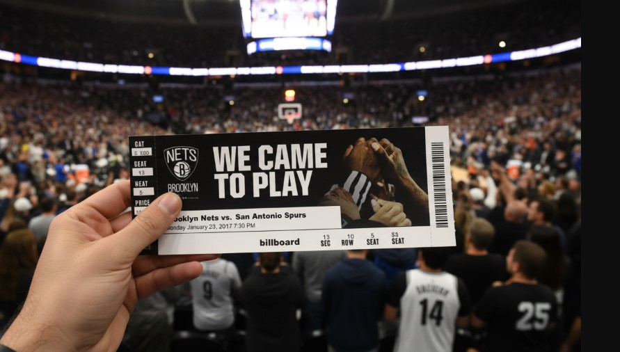 We Came to Play" text against a backdrop of a crowded basketball arena