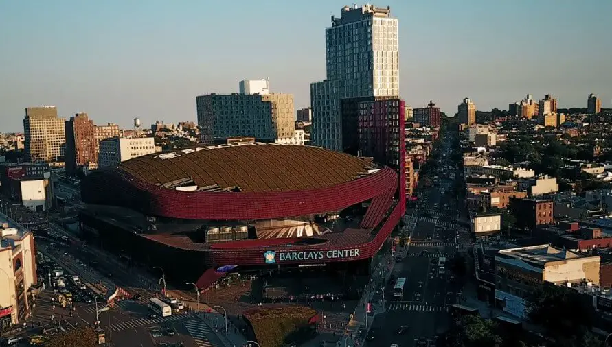 Aerial view of Barclays Center in Brooklyn, New York, surrounded by city buildings