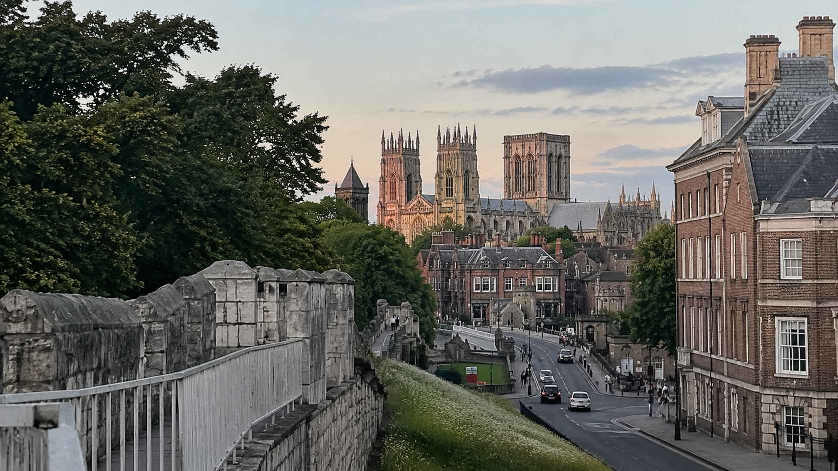 Historic York city walls with York Minster in the distance